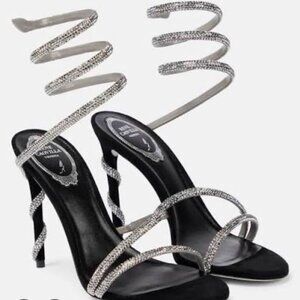 Rene Caovilla silver heels.